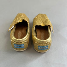 Load image into Gallery viewer, TOMS gold baby shoes
