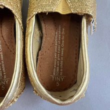 Load image into Gallery viewer, TOMS gold baby shoes
