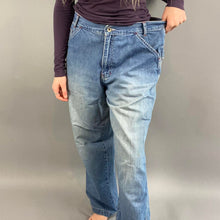 Load image into Gallery viewer, Vintage old navy blue jeans
