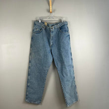 Load image into Gallery viewer, Wrangler relaxed fit men’s jeans

