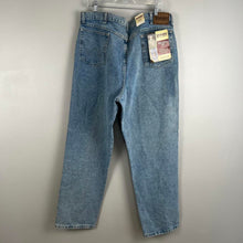 Load image into Gallery viewer, Wrangler relaxed fit men’s jeans
