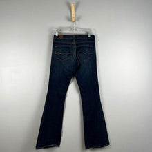 Load image into Gallery viewer, Red engine flare dark wash jeans
