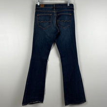 Load image into Gallery viewer, Red engine flare dark wash jeans
